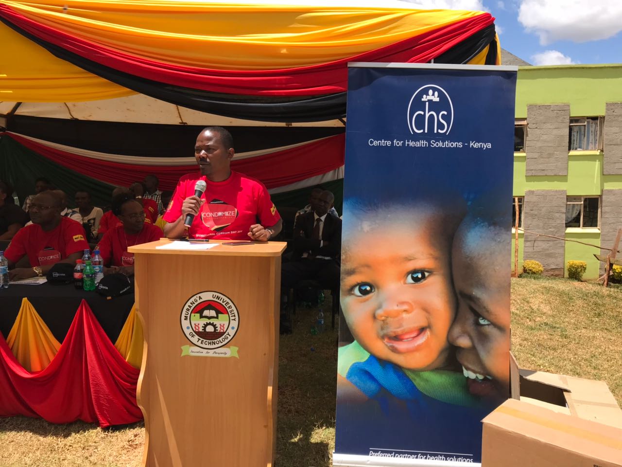 Murang’a County CEC for Health Joseph Mbae speaking during the International Condom Day commemoration at Murang’a University